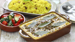 bobotie is a curry flavored meatloaf with baked egg on top 