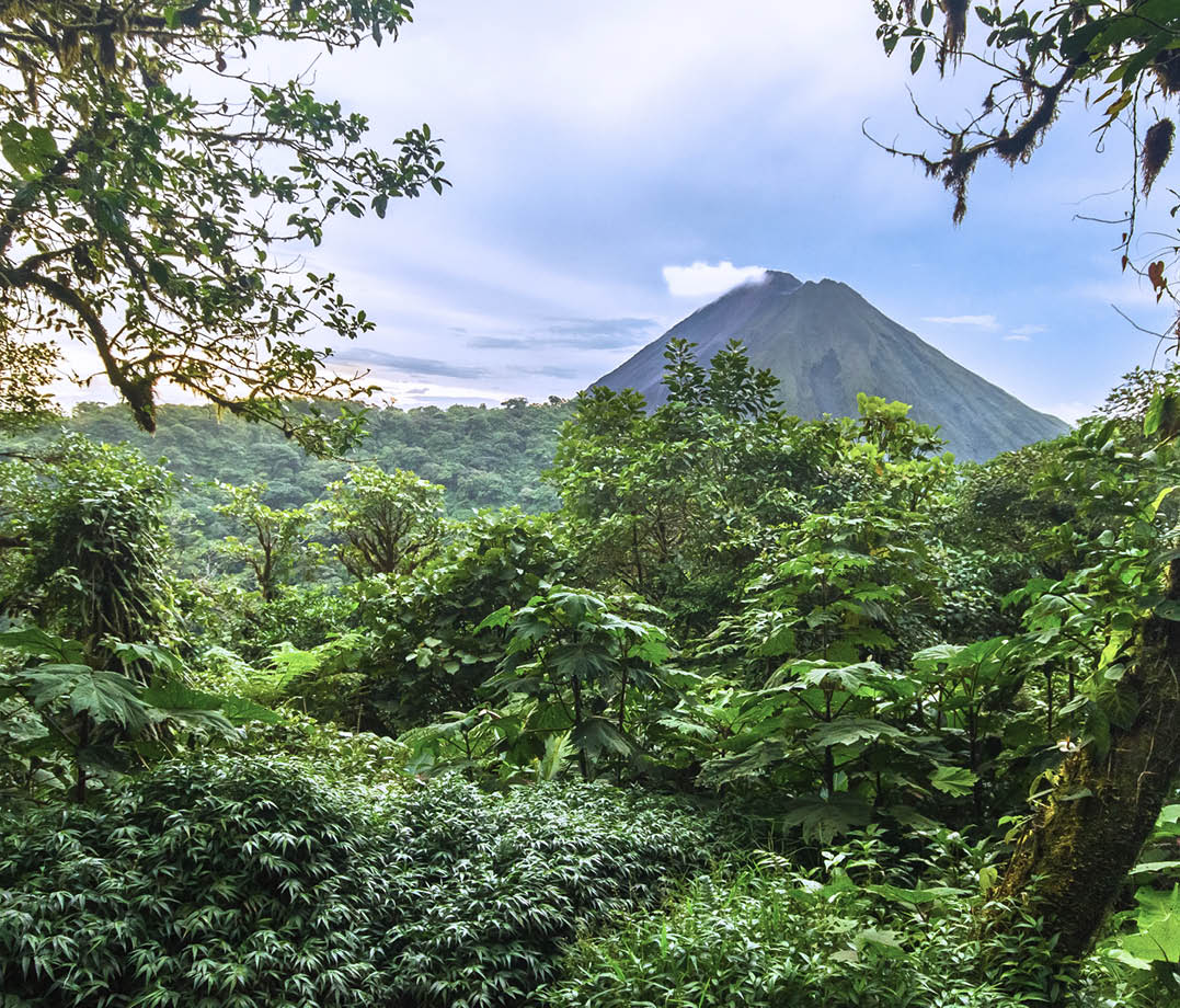Volcan Arenal rises out of the jungle and dominates the landscape near the town of La Fortuna, Costa Rica 