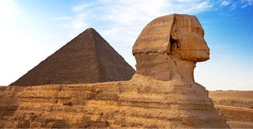 Sphinx and Pyramid Giza, Egypt  The Great Pyramid of Giza is one of the original Seven Wonders of the World    