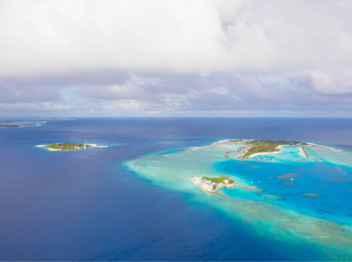 Aerial view on Maldives island, Raa atol