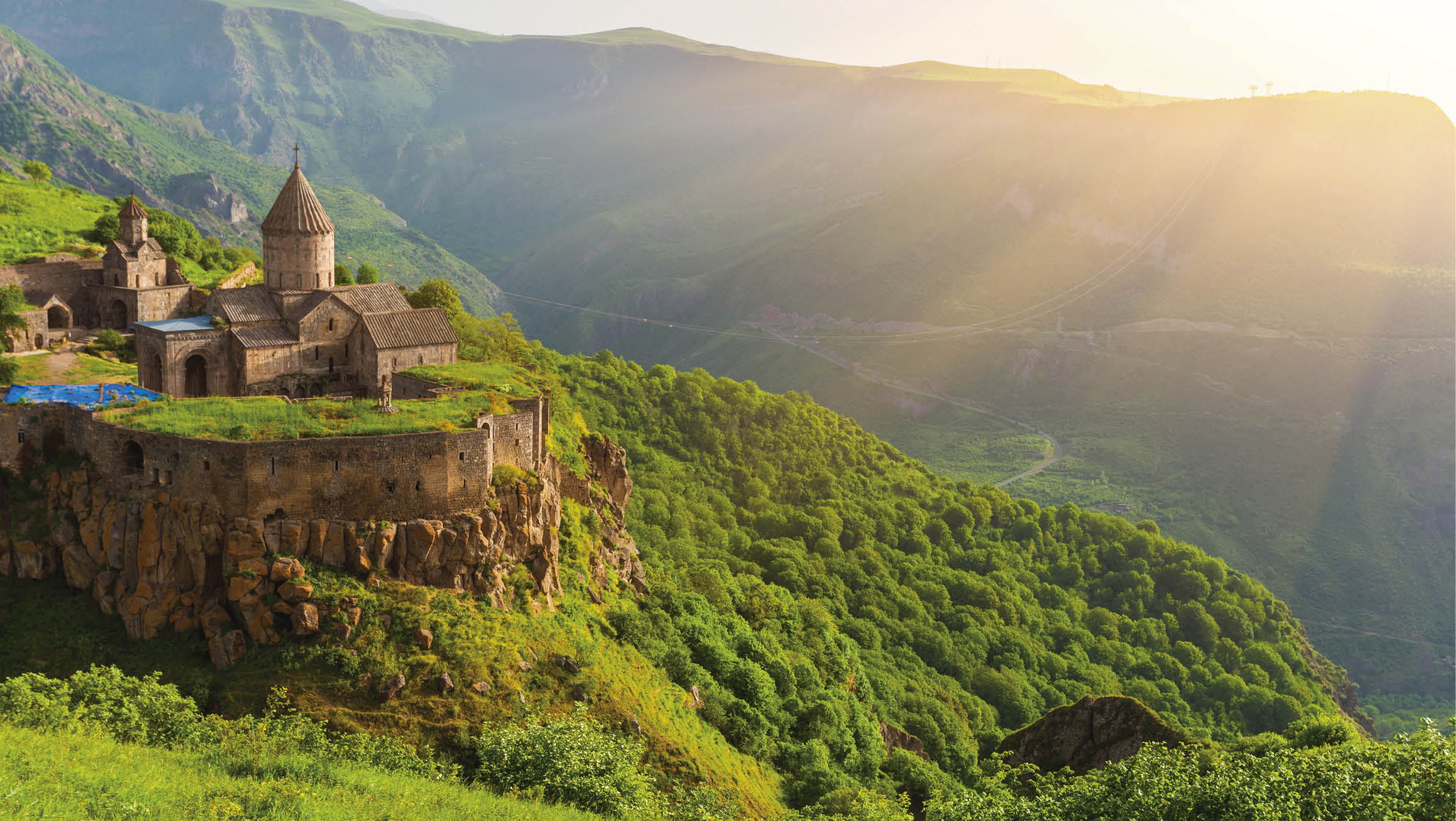 Ancient monastery in setting sun  Tatev  Armenia