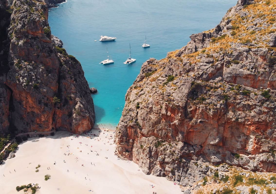 aerial view of small beach of Mediterranean sea, between cliffs, Sa Calobra, Torrent De Pareis beach,Serra De Tramuntana, Mallorca, Spain  High quality photo