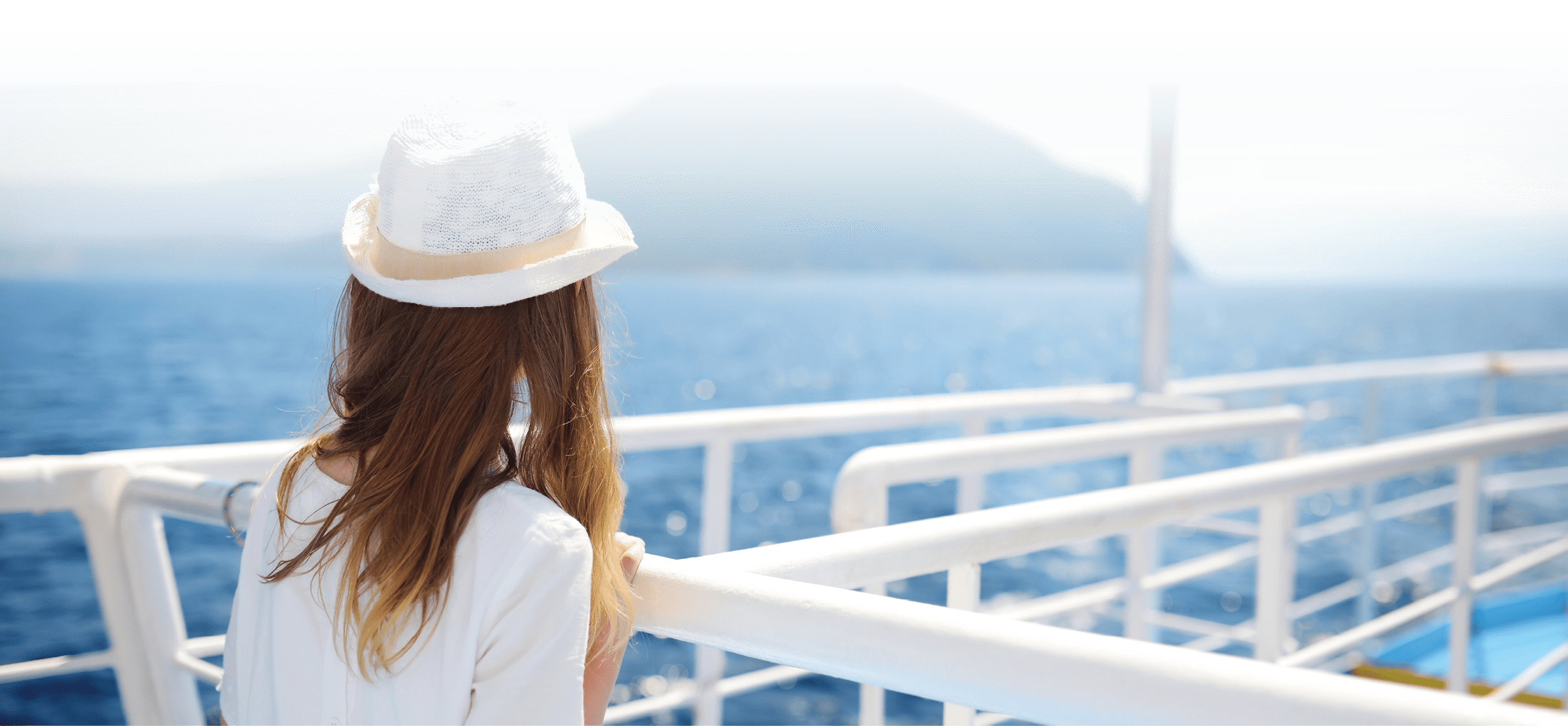 Adorable young girl enjoying ferry ride staring at the deep blue sea  Child having fun on summer family vacation in Greece  Kid sailing on a boat 