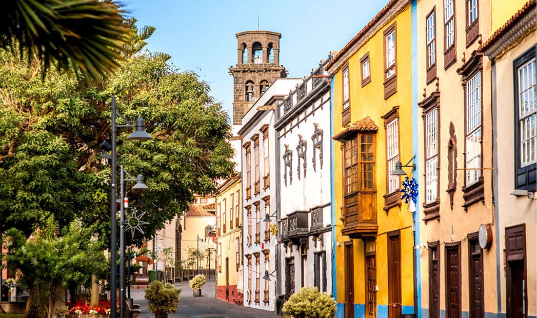 City street view with church tower in La Laguna town on Tenerife island