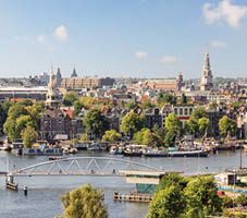AMSTERDAM - SEP 2, 2014: City view of Amsterdam  The city is known as Venice of the North, its canal belt was finally added to the world heritage list in July 2010 