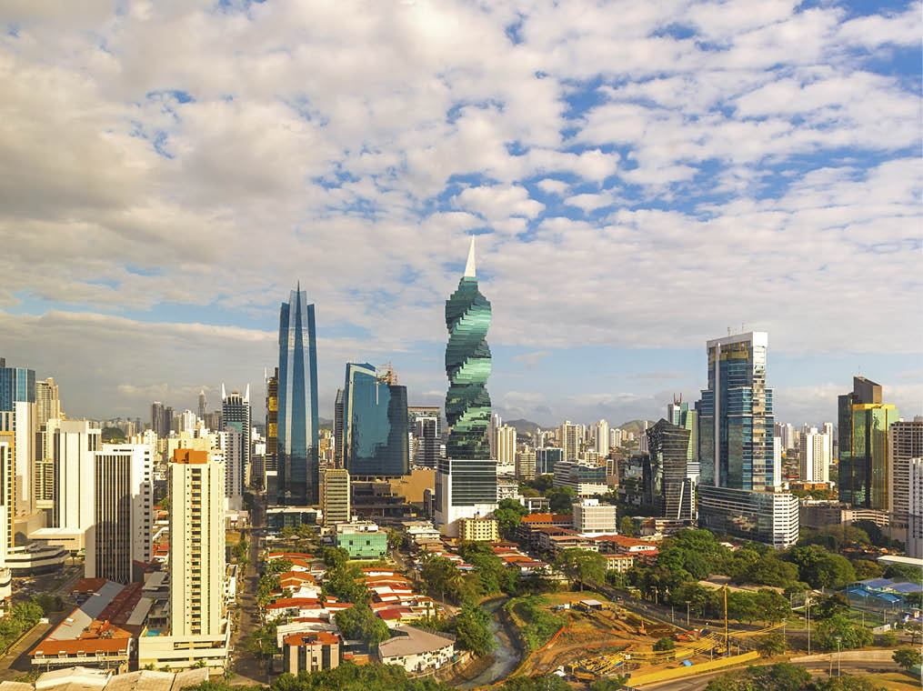 The urban skyline of Panama city with its skyscrapers and the financial district at sunrise, Panama 