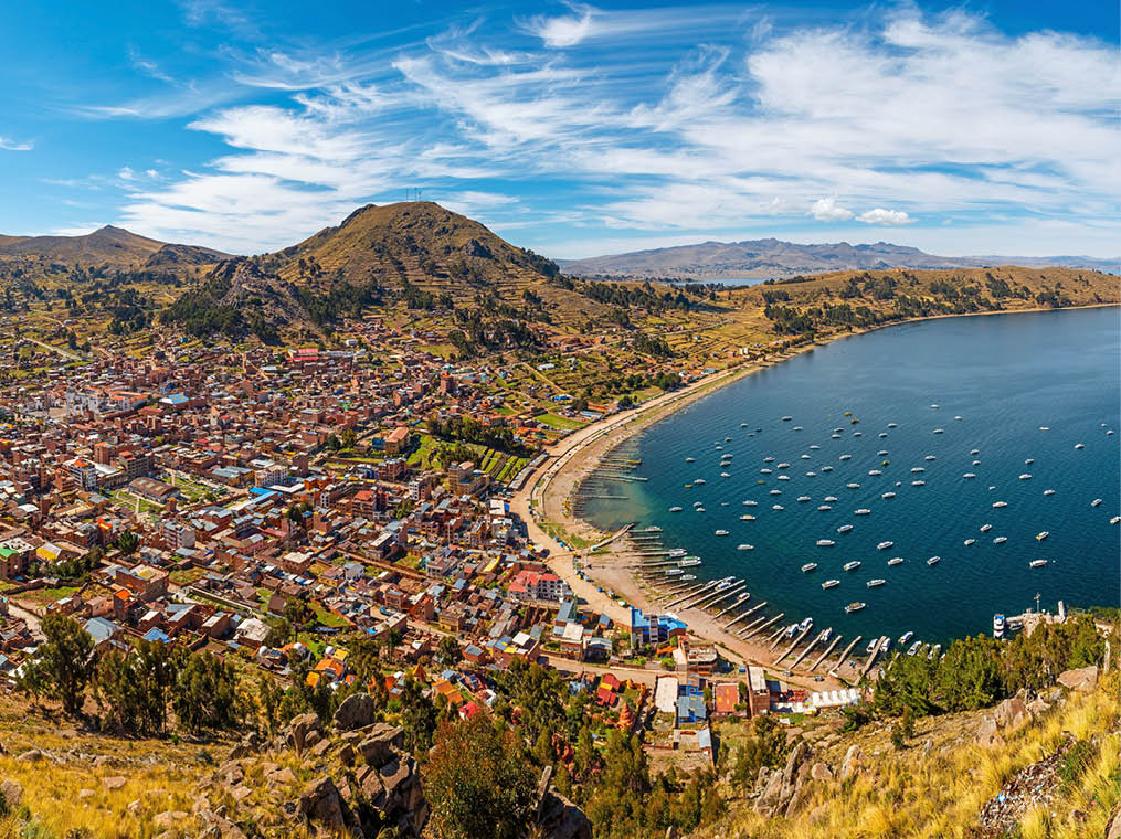 Panorama cityscape of Copacabana city and the Titicaca Lake at sunset, Bolivia 