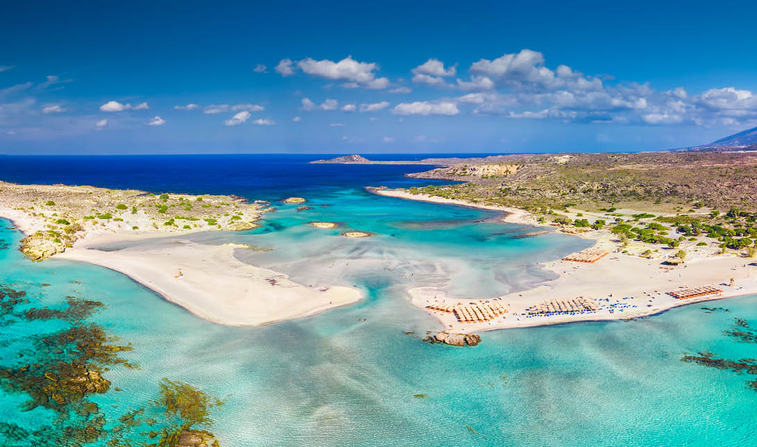 Aerial view of Elafonissi beach on Crete island with azure clear water, Greece, Europe  Crete is the largest and most populous of the Greek islands  