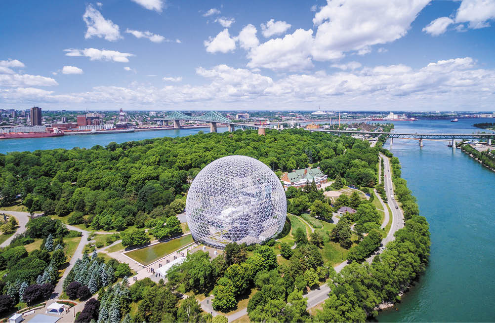 Montreal, Canada - July 3, 2016: Aerial view of Montreal cityscape including the Biosphere geodesic dome and Jacques Cartier bridge in Montreal, Quebec, Canada 