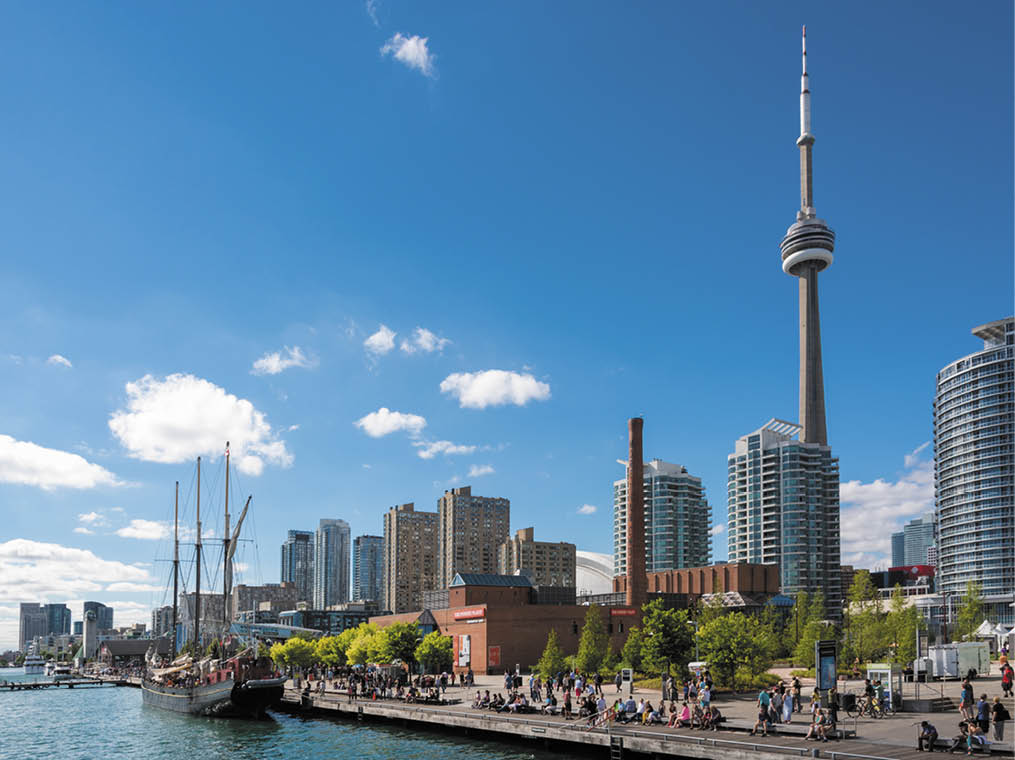 TORONTO, CANADA - SEPTEMBER 2013 - People enjoying beautiful sunny afternoon near lake Ontario in Toronto