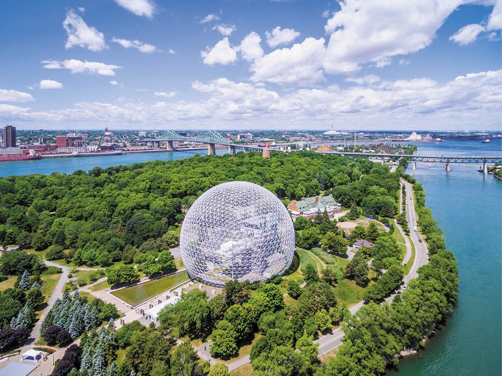 Montreal, Canada - July 3, 2016: Aerial view of Montreal cityscape including the Biosphere geodesic dome and Jacques Cartier bridge in Montreal, Quebec, Canada 