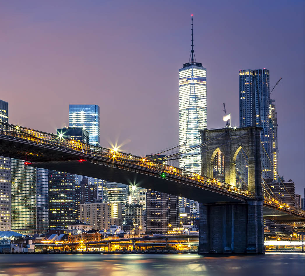 View of Brooklyn bridge by night, New York, USA