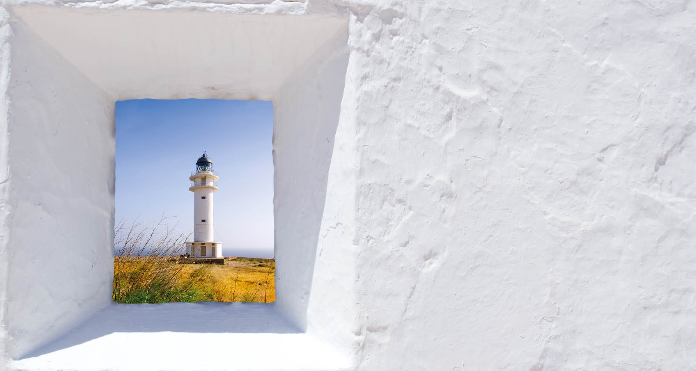 Formentera mediterranean white window with Barbaria lighthouse