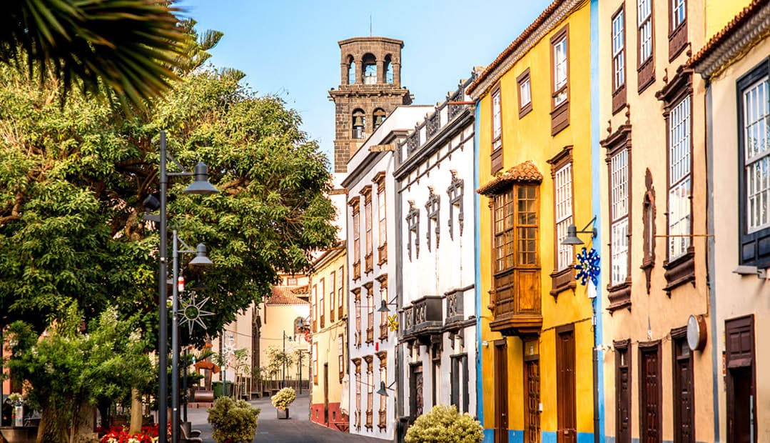 City street view with church tower in La Laguna town on Tenerife island