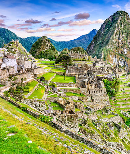 Machu Picchu in Peru - Ruins of Inca Empire city and Huaynapicchu Mountain in Sacred Valley, Cusco, South America.