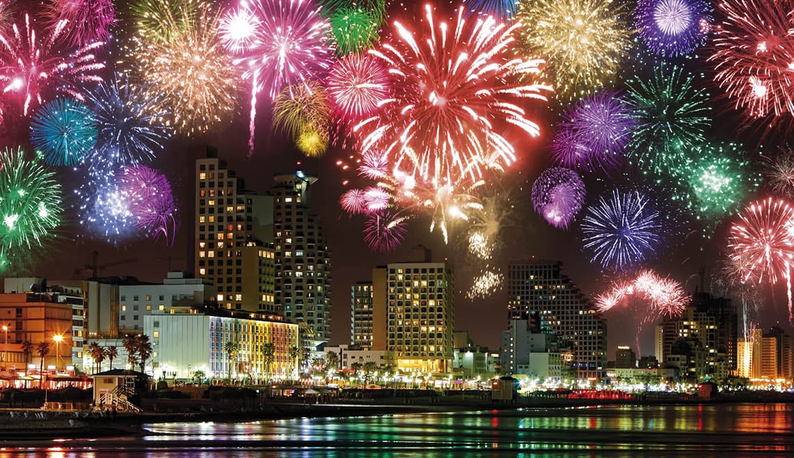 Celebratory fireworks at coast of Tel Aviv. Mediterranean Sea. Israel