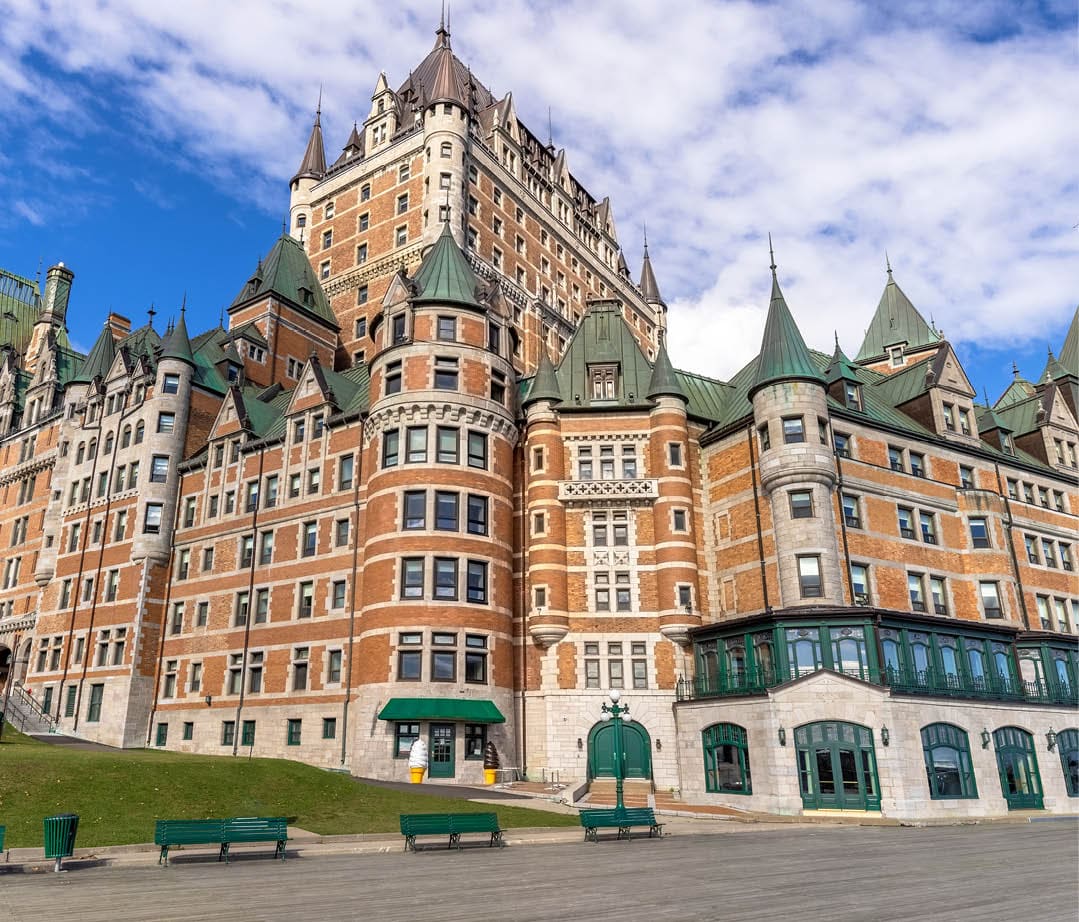 Famous Chateau Frontenac in Quebec historic center located on Dufferin Terrace promenade with scenic views and landscapes of Saint Lawrence River.