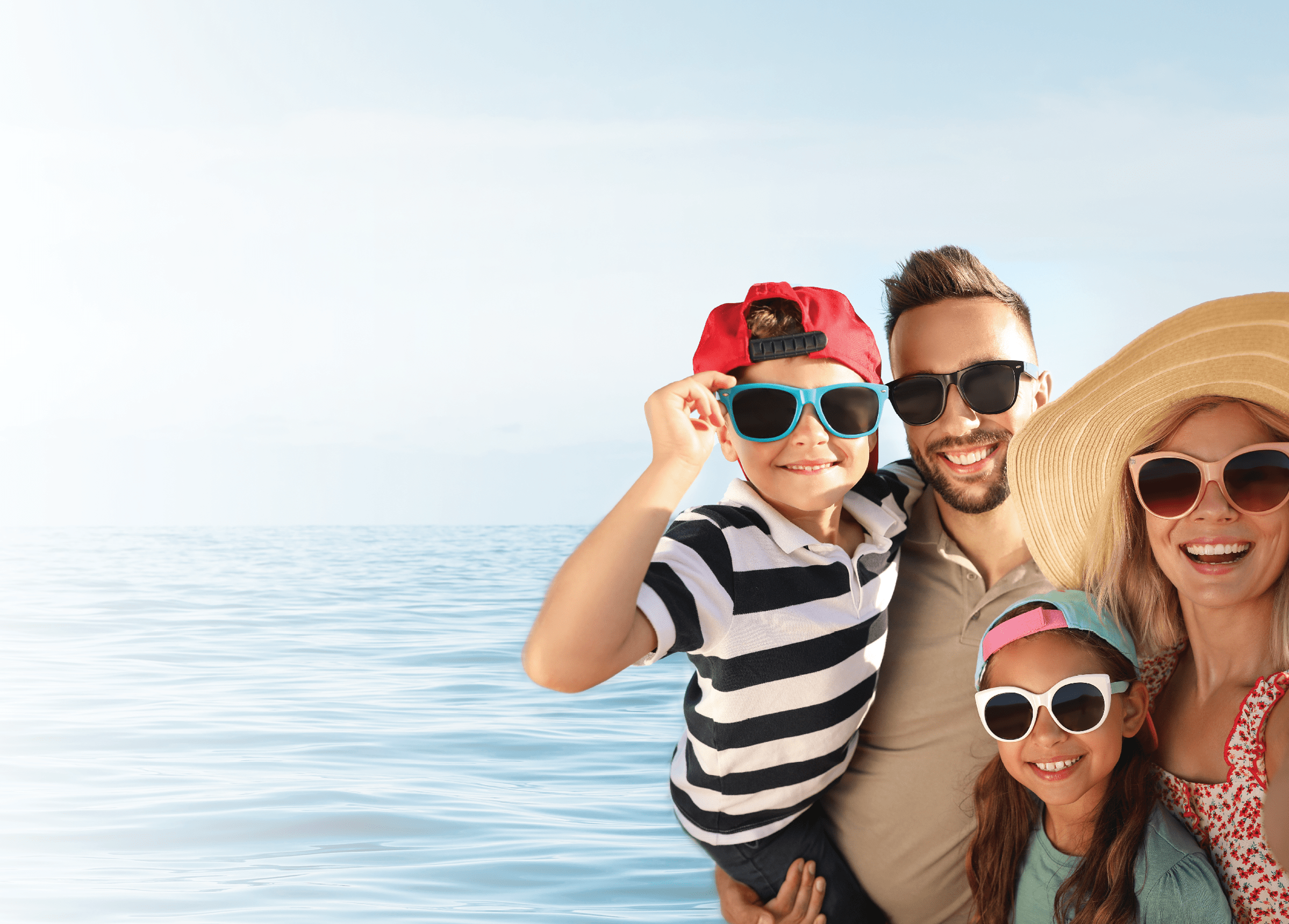 Happy family taking selfie on beach near sea  Summer vacation
