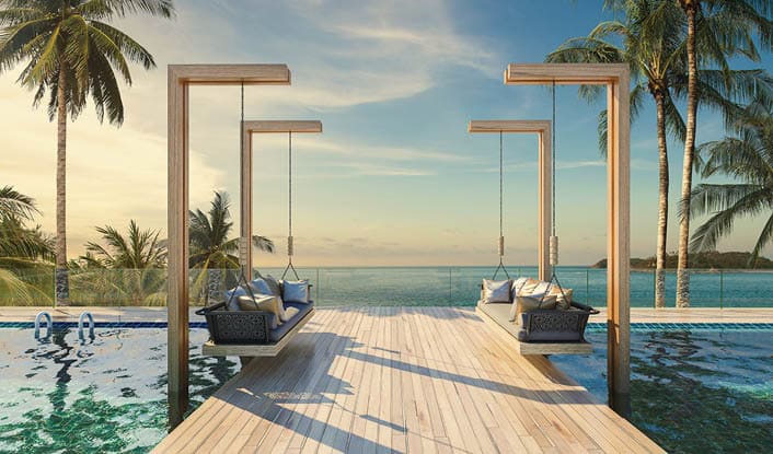 Beautiful Swing sofa on the Swimming pool waters outdoor tropical beach coastline with blue ocean sea horizon