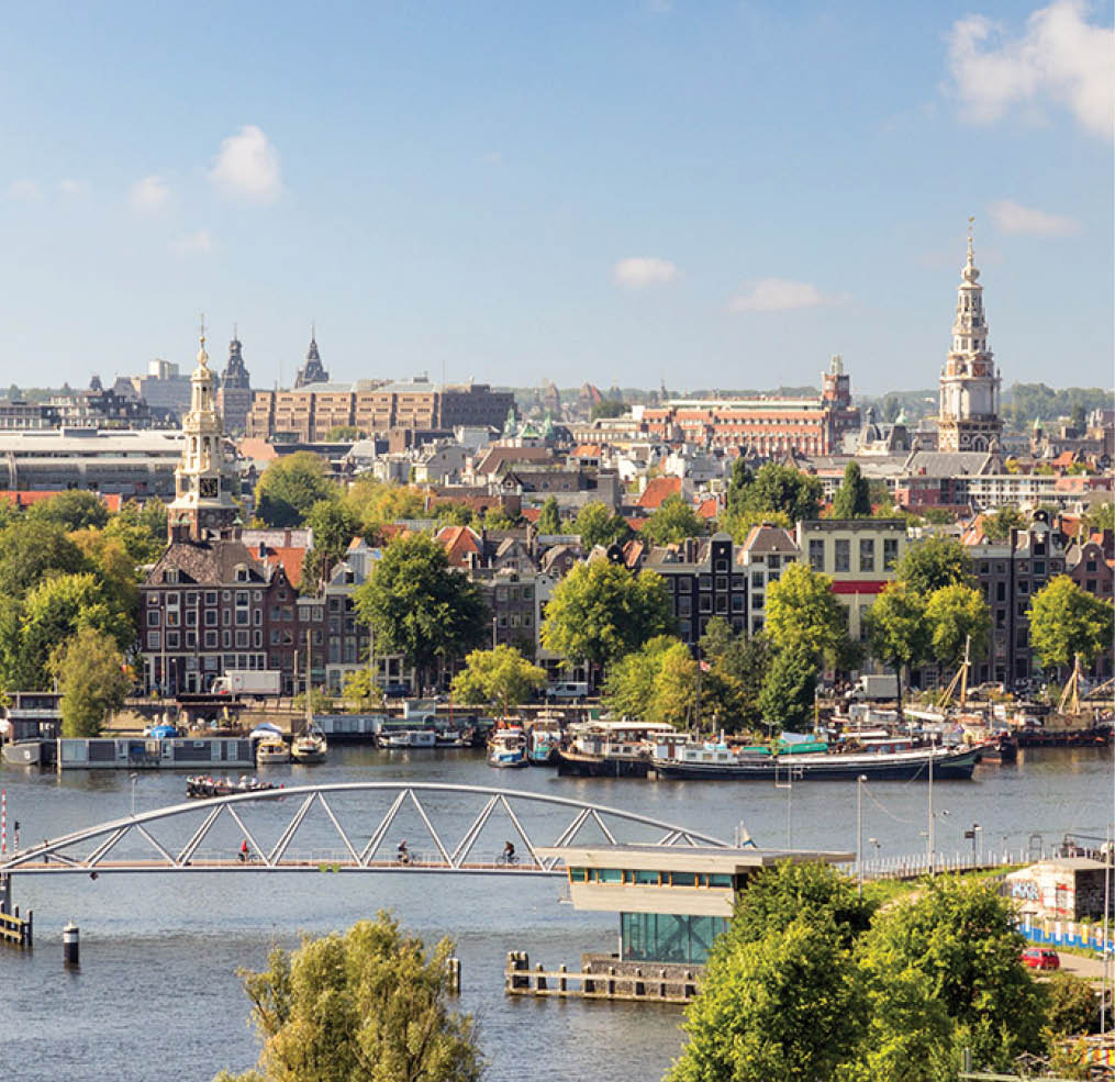 AMSTERDAM - SEP 2, 2014: City view of Amsterdam  The city is known as Venice of the North, its canal belt was finally added to the world heritage list in July 2010 