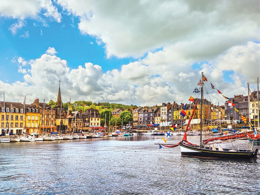 Honfleur famous village harbor skyline, boats and water  Normandy, France, Europe 