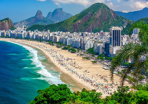 Copacabana beach in Rio de Janeiro, Brazil  Copacabana beach is the most famous beach of Rio de Janeiro, Brazil  Skyline of Rio de Janeiro 