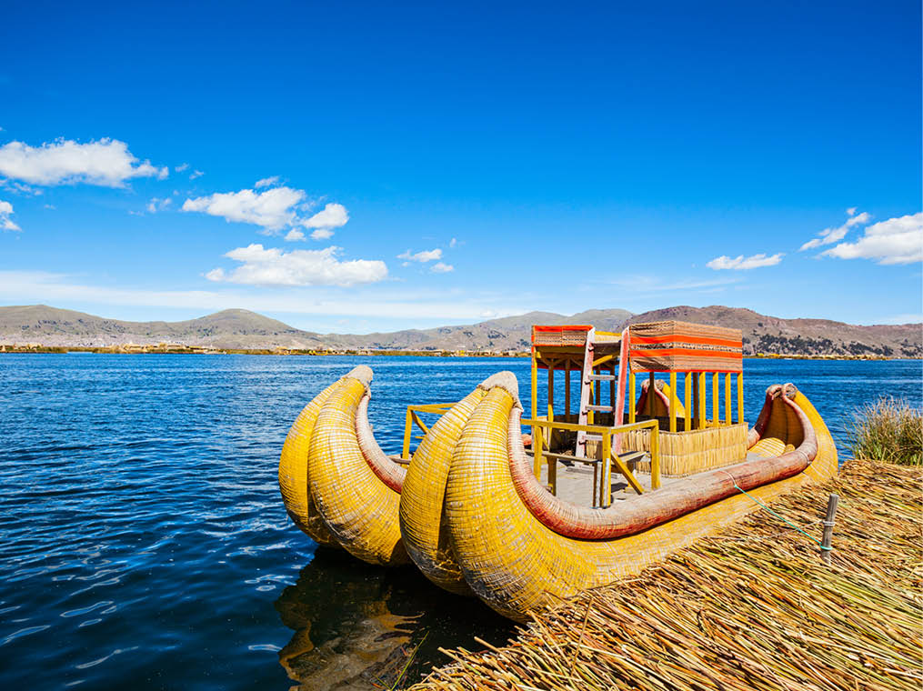 Totora boat on the Titicaca lake near Puno, Peru