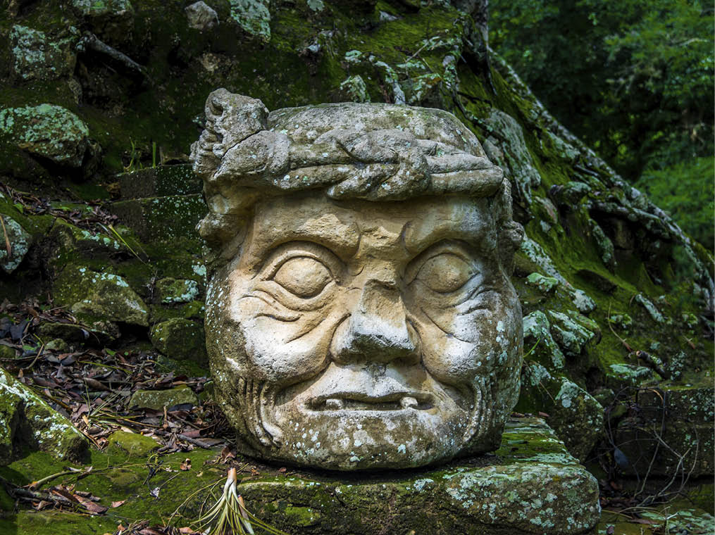 Carved old man head at Mayan Ruins - Copan Archaeological Site, Honduras