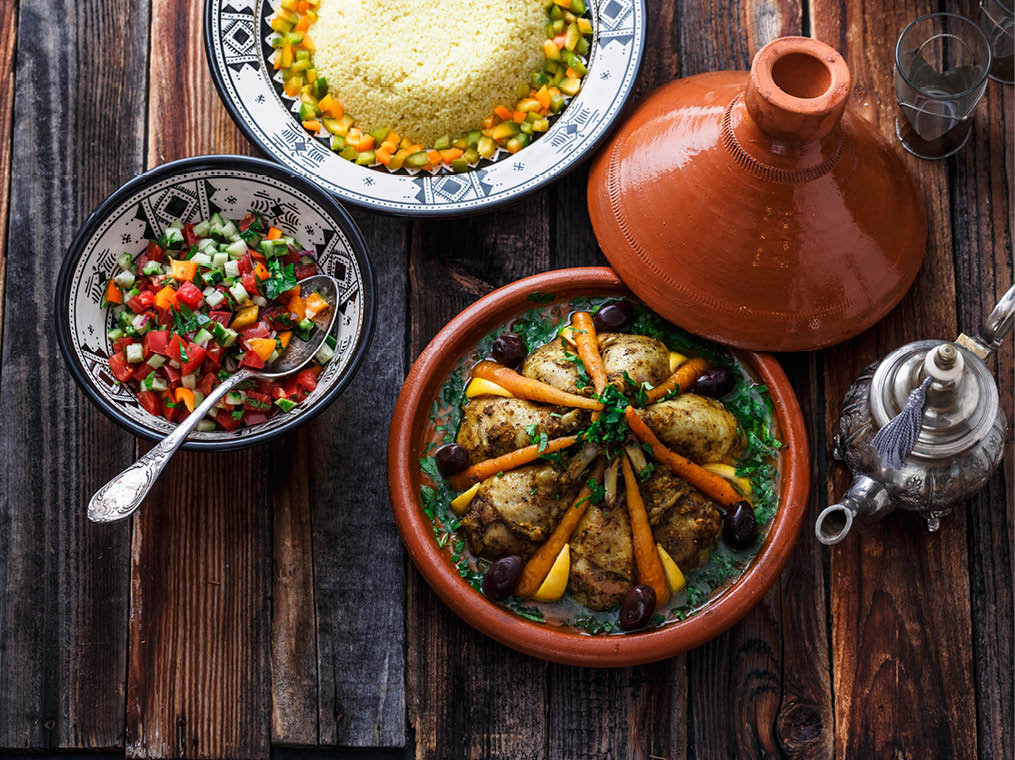 Morrocan cuisine chicken tajine, couscous and salad 