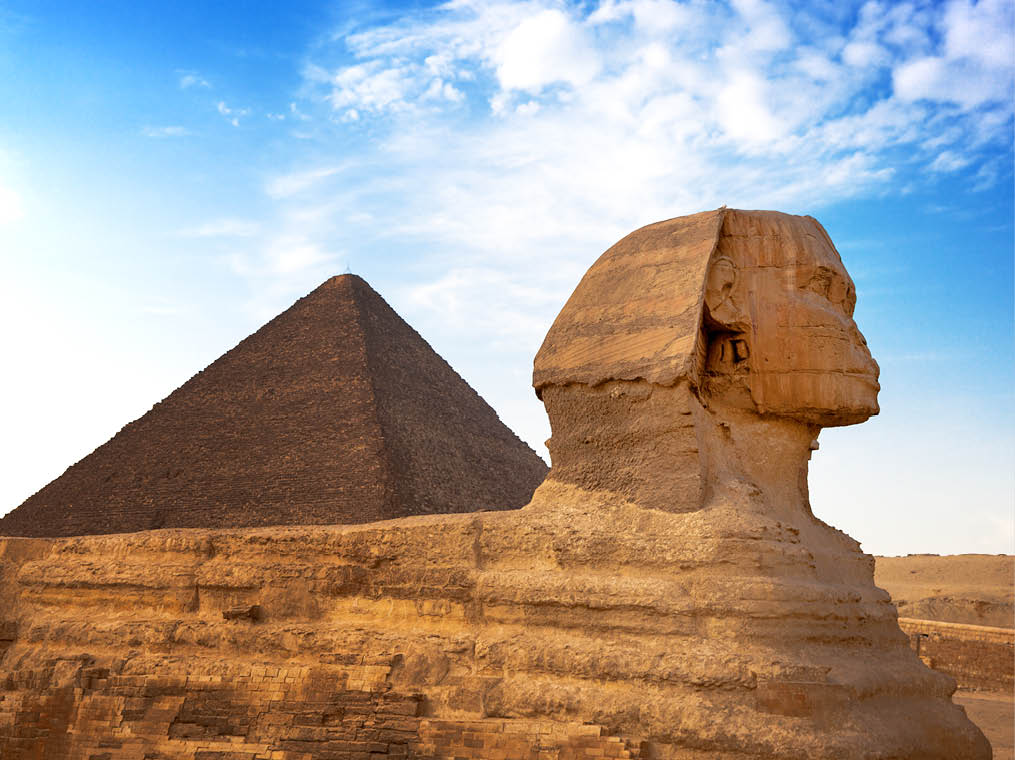 Sphinx and Pyramid Giza, Egypt  The Great Pyramid of Giza is one of the original Seven Wonders of the World    