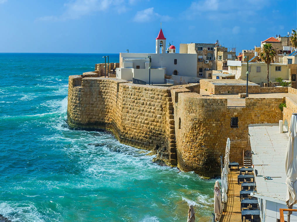 The Acre cityscape with the St John's church, surrounded by sea walls and old residential neighborhood, Israel 