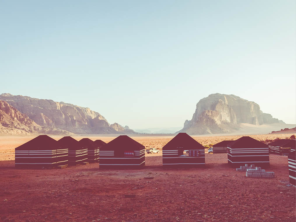 Red sand desert and Bedouin camp at sunny summer day in Wadi Rum, Jordan  Middle East  