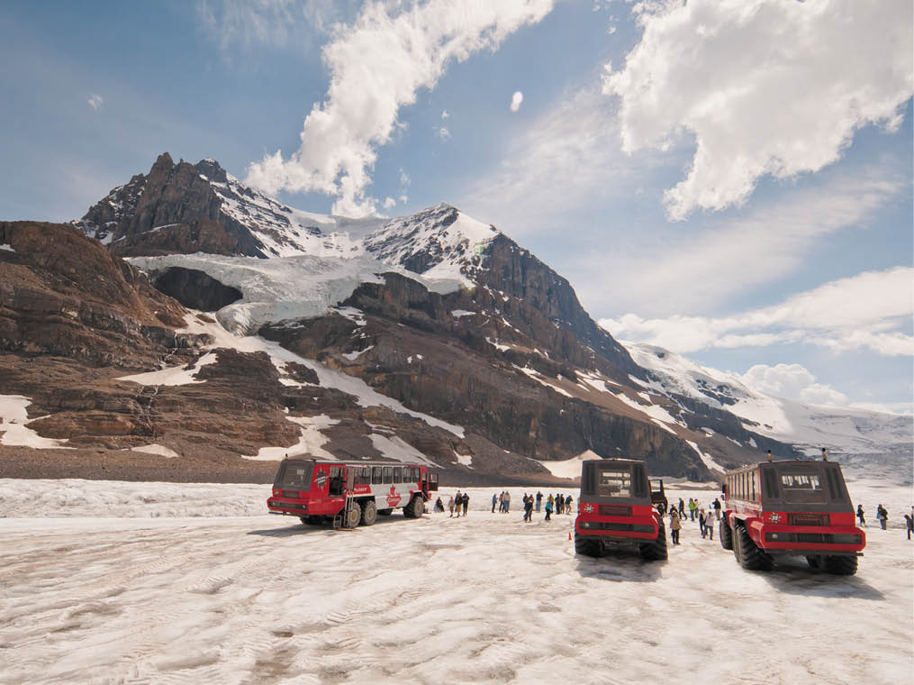 Huge Ice Explorer vehicles parked on Colulmbia Icefield 